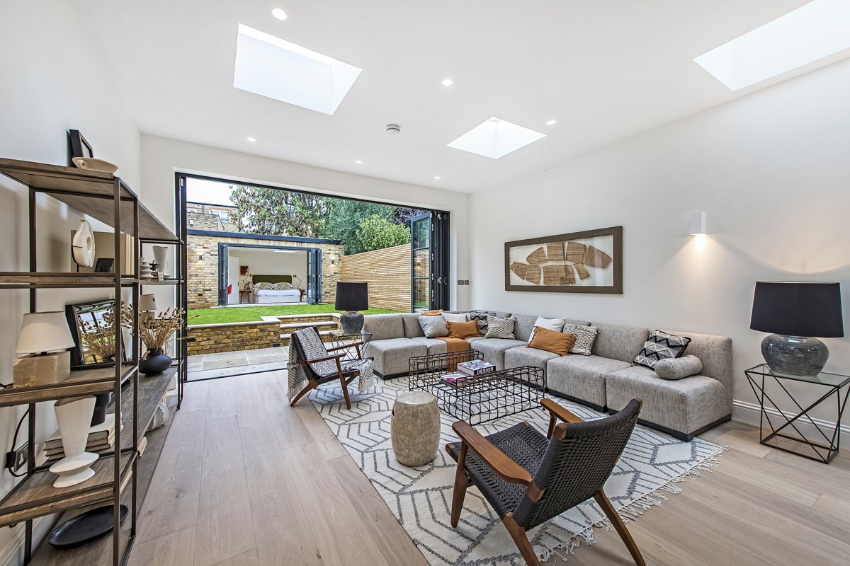 Living room opening onto the garden in the Fulham SW6 house